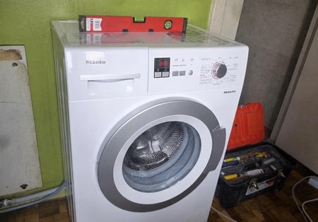 Установка стиральных машин Miele